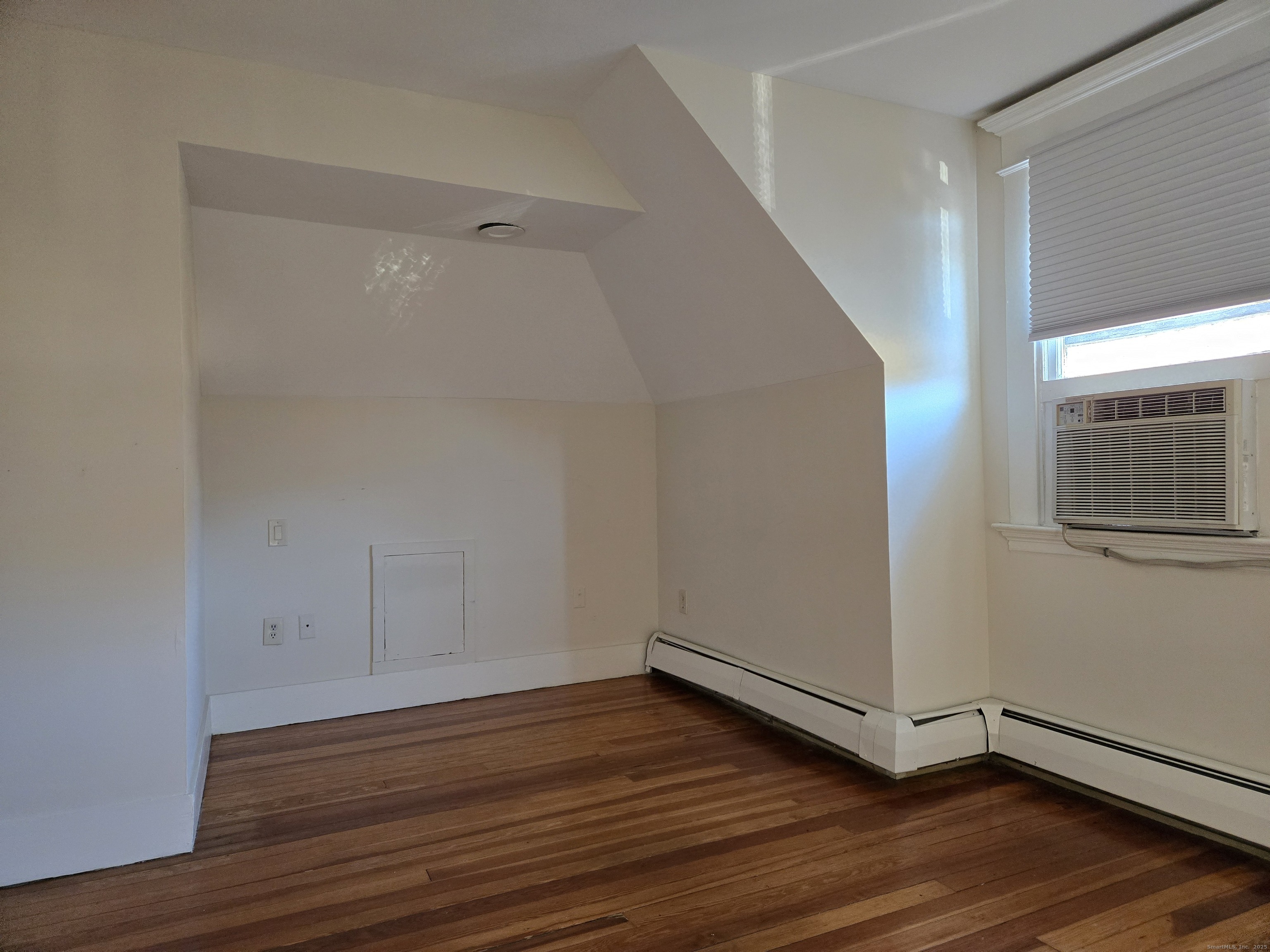 188 Cold Spring Street, Unit 3 New Haven, CT 06511 - Photo 17 of 20 a view of an empty room with wooden floor