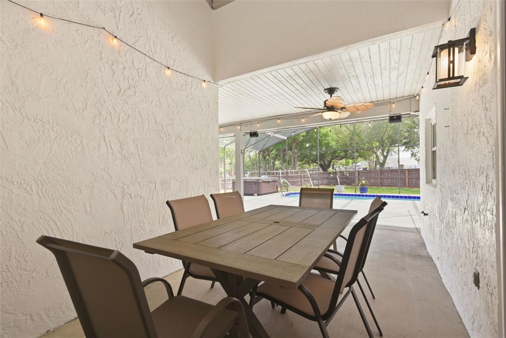 7432 Sparkling Lake Road Orlando, FL 32819 - Photo 30 of 54 a view of a dining room with furniture window and outside view