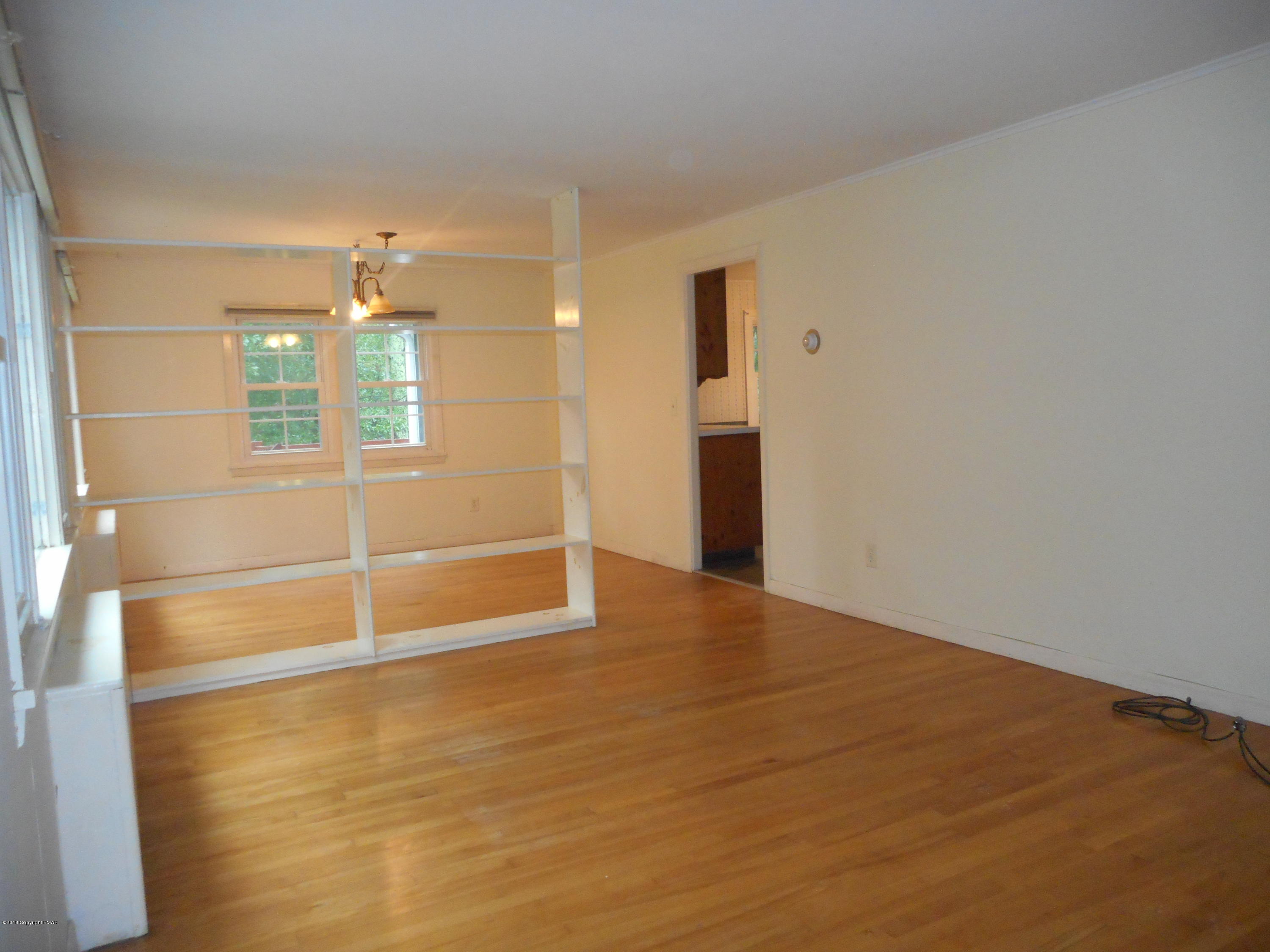 752 White Oak Road Cresco, PA 18326 - Photo 12 of 36 Living Room w/ shelving