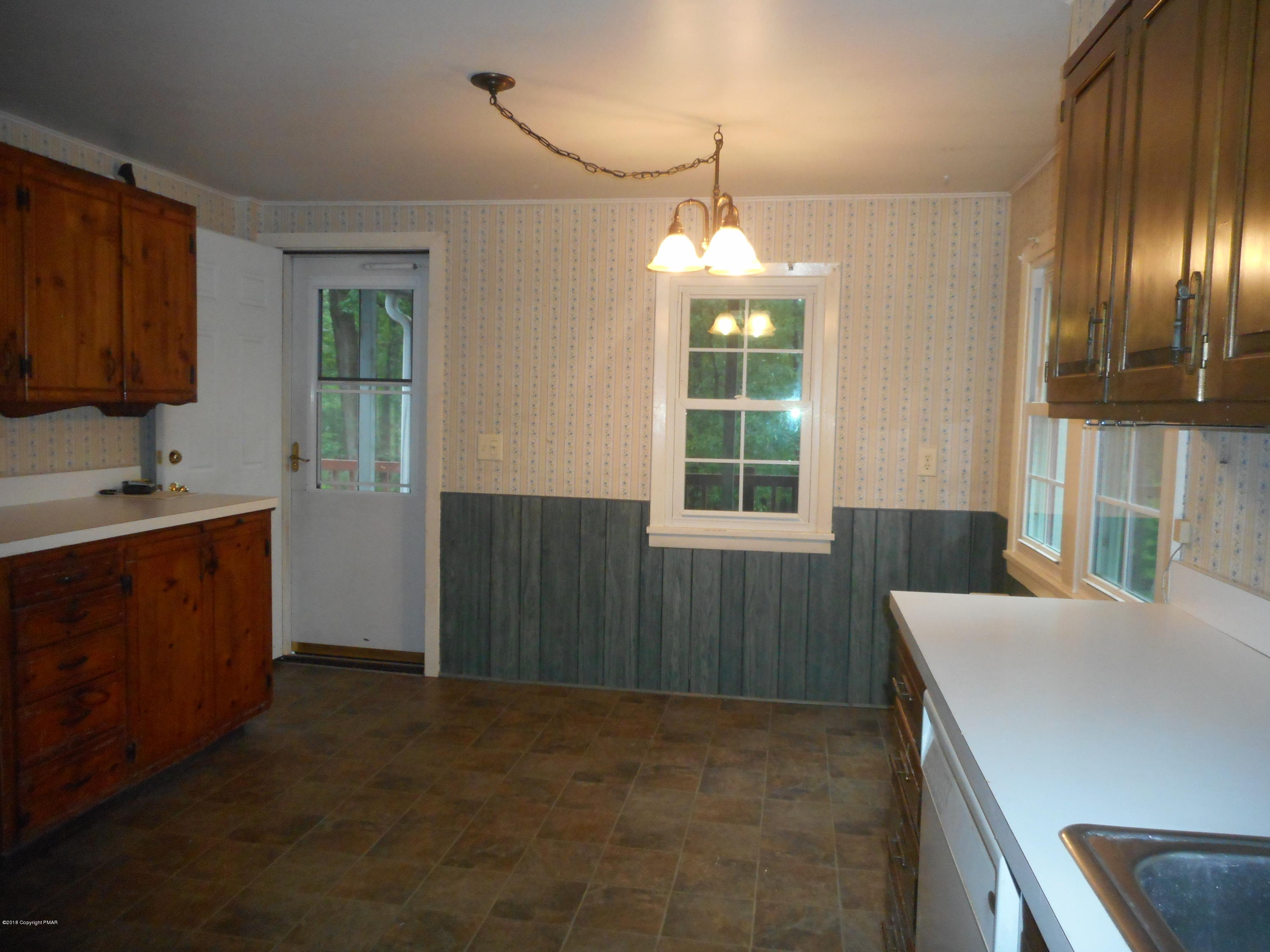 752 White Oak Road Cresco, PA 18326 - Photo 18 of 36 Door to screened Porch