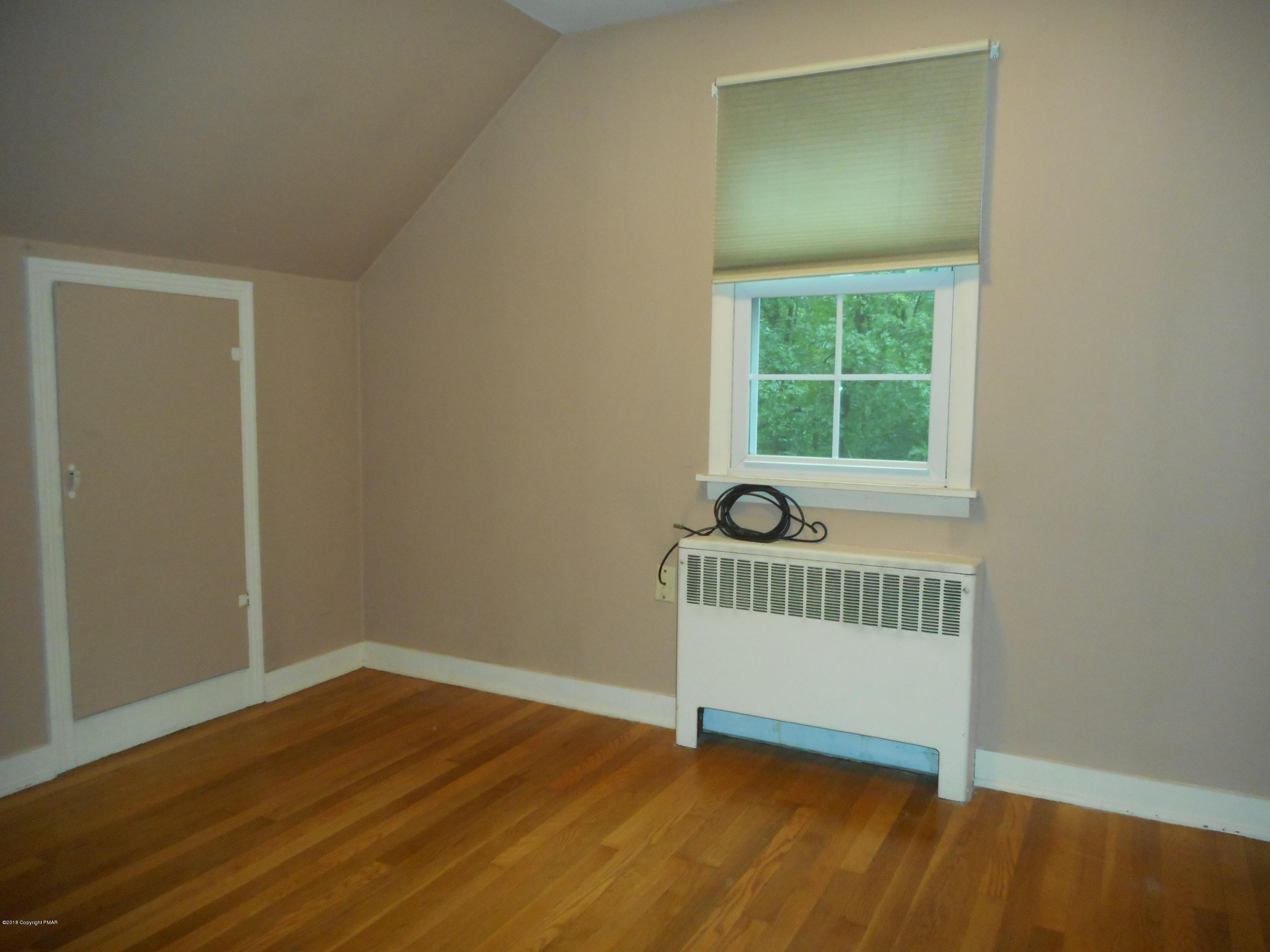 752 White Oak Road Cresco, PA 18326 - Photo 34 of 36 TV room w/ Eave storage