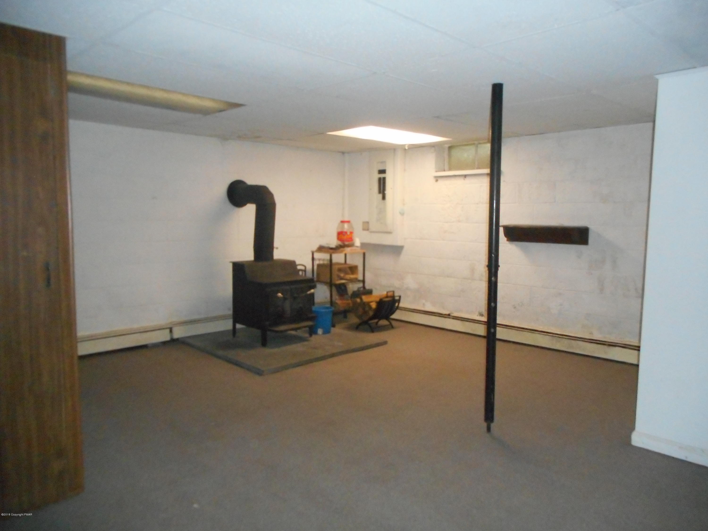 752 White Oak Road Cresco, PA 18326 - Photo 36 of 36 Woodstove area