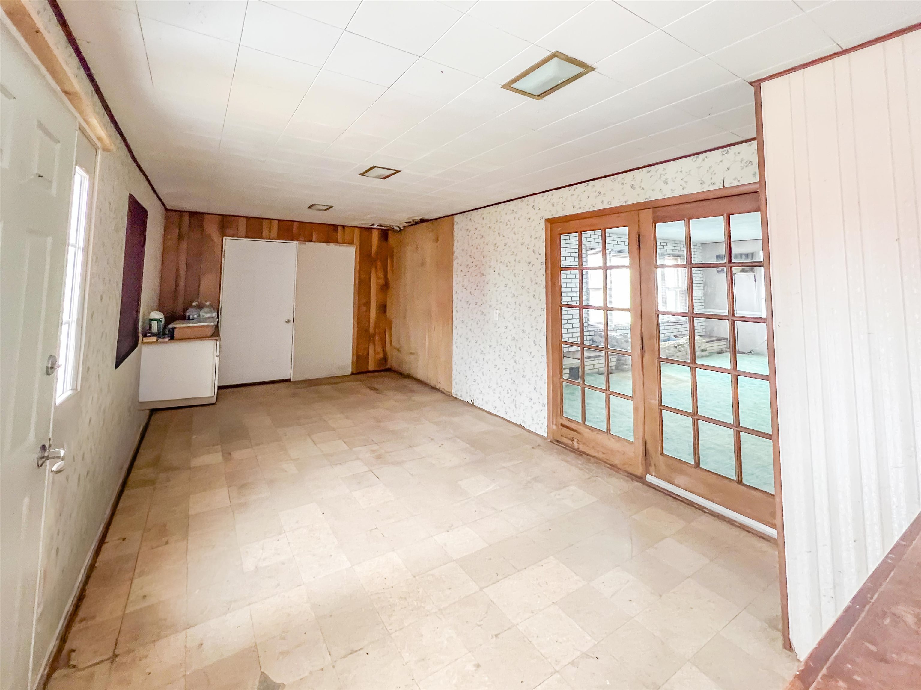 3114 South Rush Creek Road Stockton, IL 61085 - Photo 19 of 76 a view of an empty room with a window