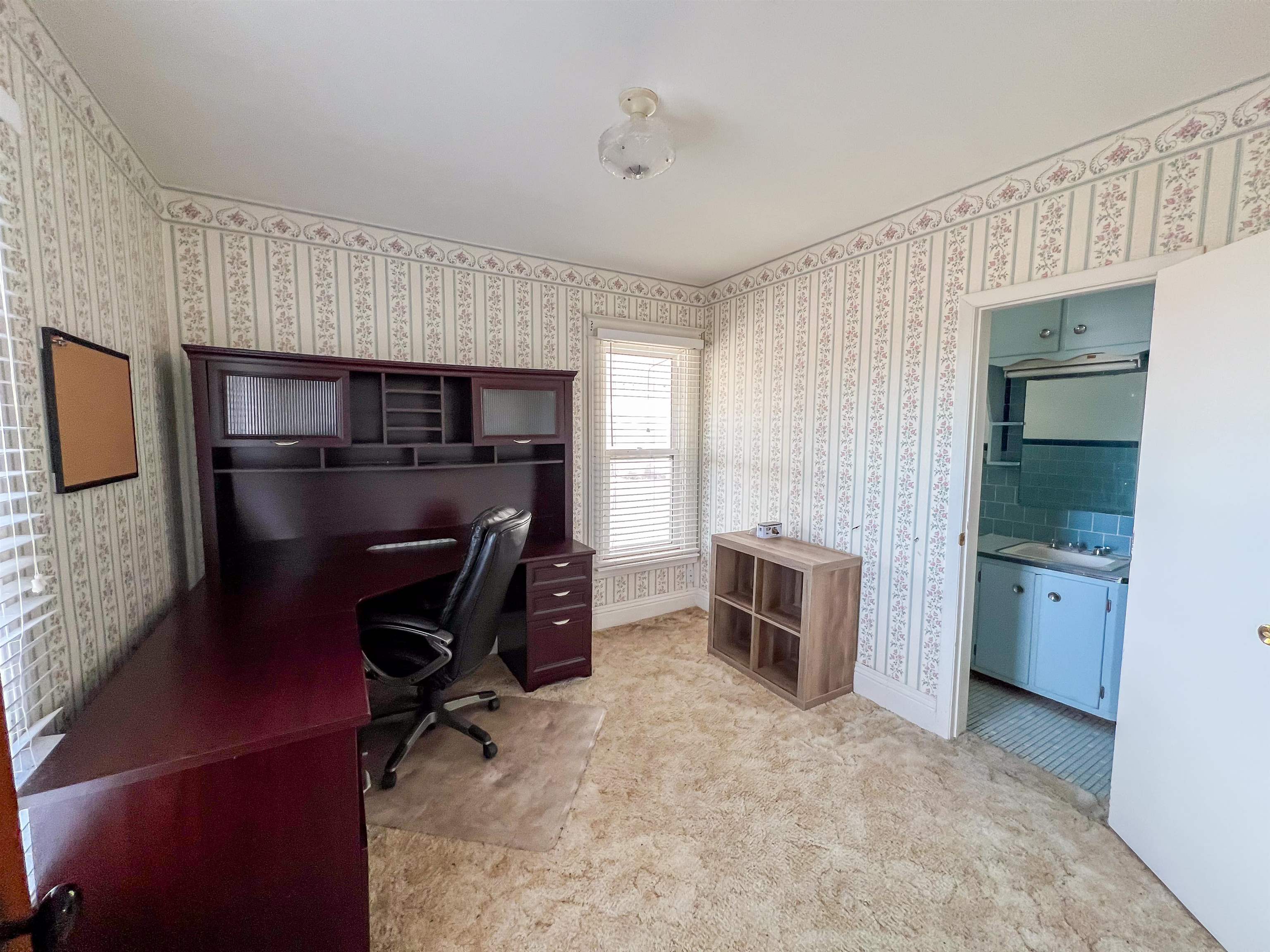 3114 South Rush Creek Road Stockton, IL 61085 - Photo 26 of 76 a room with furniture and a fireplace