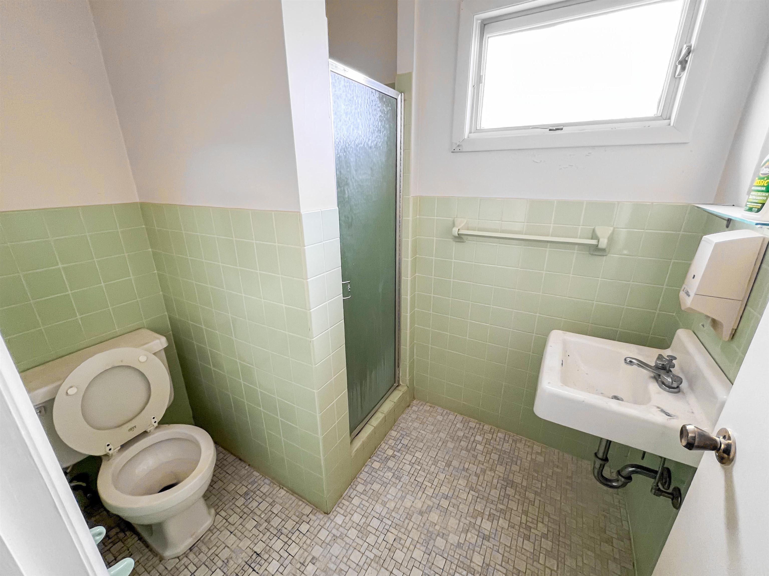 3114 South Rush Creek Road Stockton, IL 61085 - Photo 28 of 76 a bathroom with a toilet and a sink