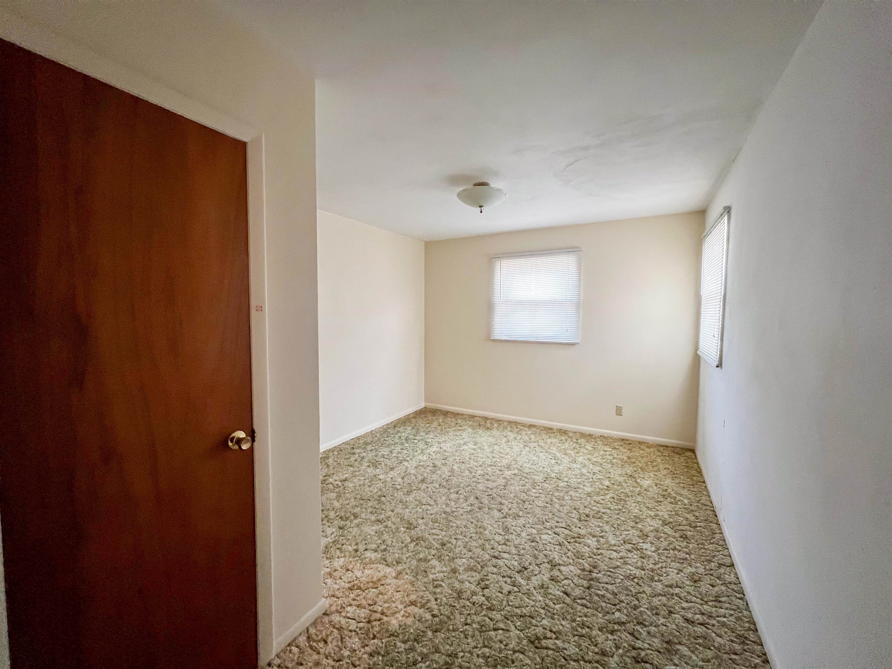 3114 South Rush Creek Road Stockton, IL 61085 - Photo 30 of 76 an empty room with a window