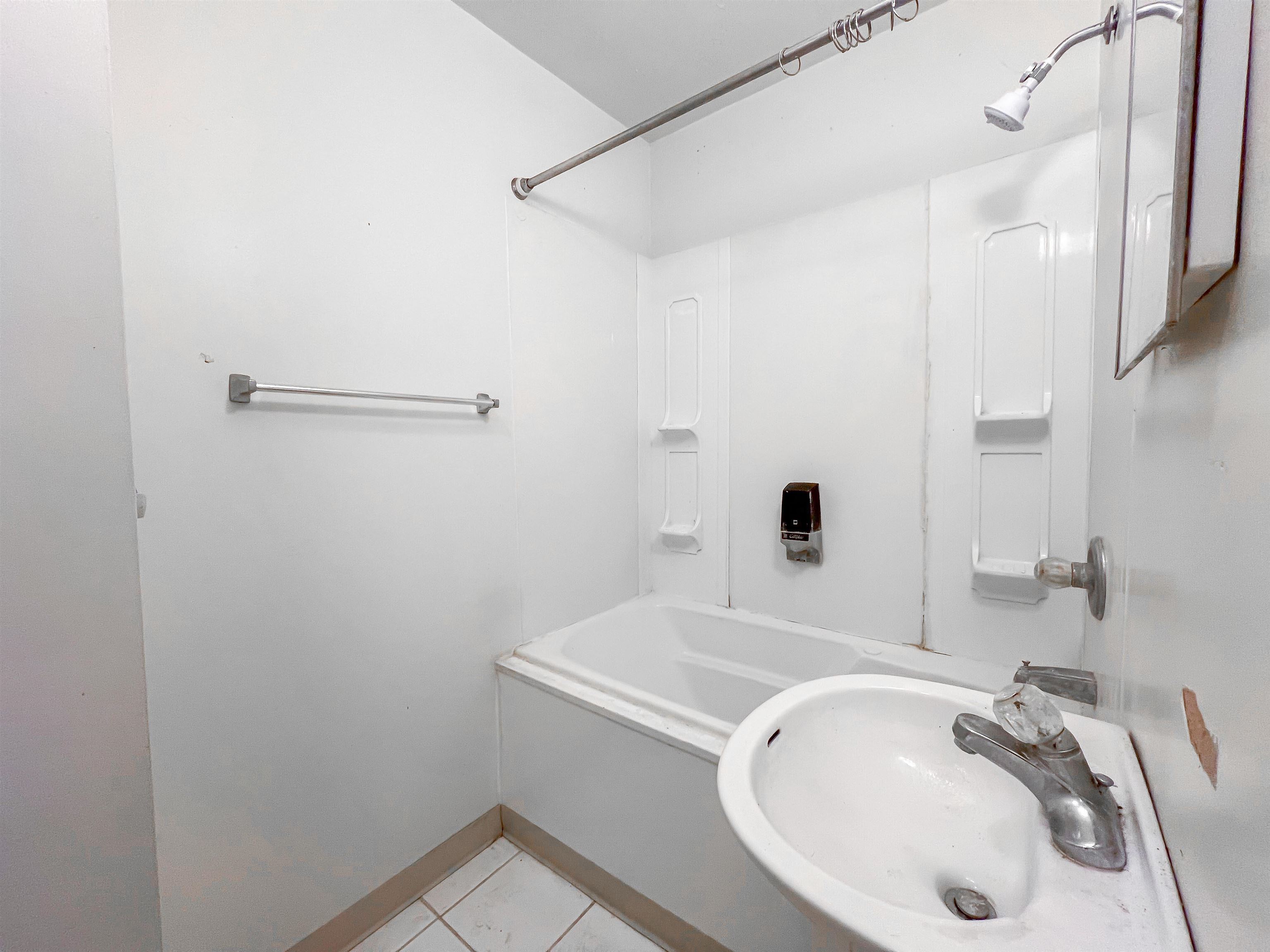 3114 South Rush Creek Road Stockton, IL 61085 - Photo 36 of 76 a bathroom with a sink and a mirror