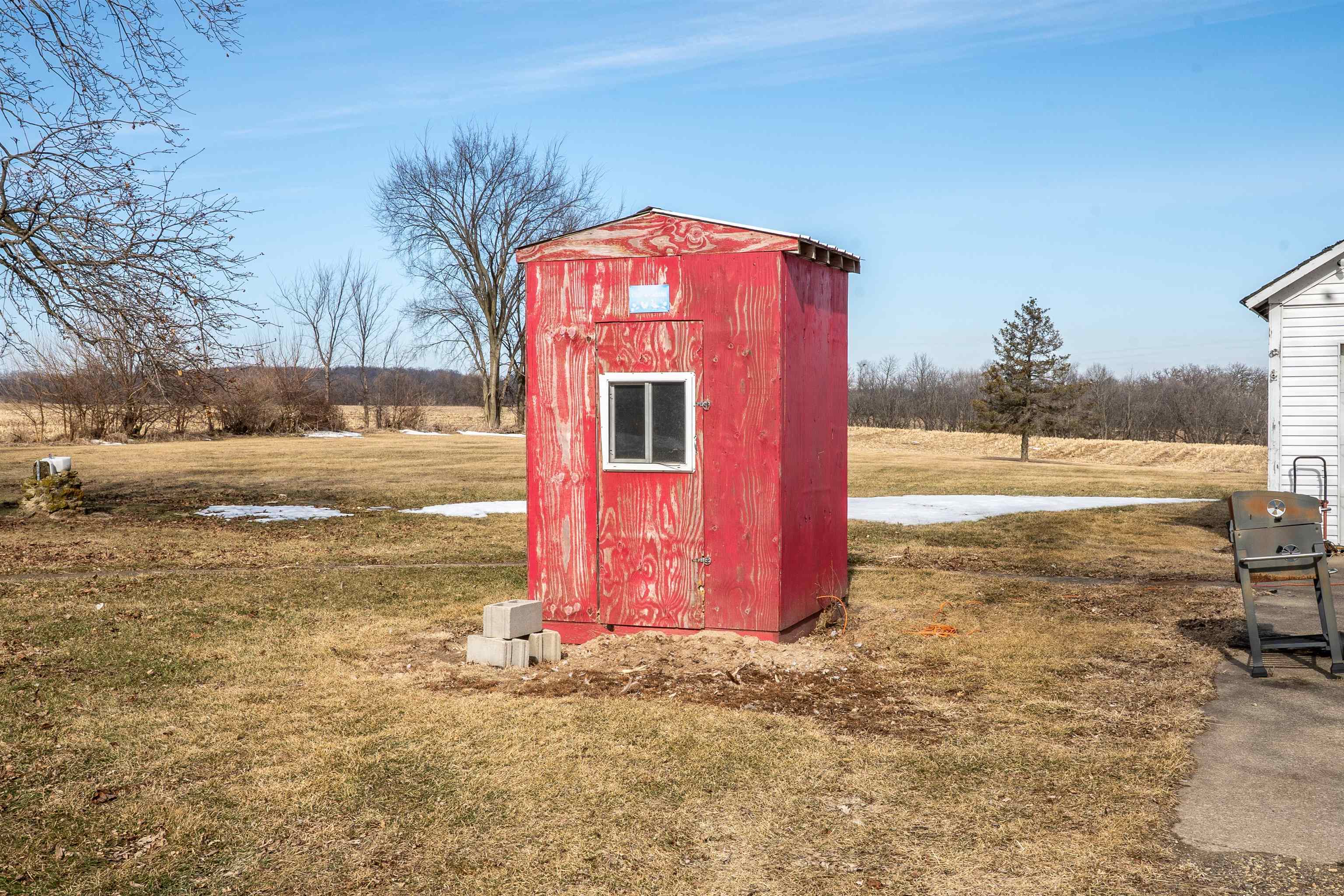 3114 South Rush Creek Road Stockton, IL 61085 - Photo 38 of 76 a front view of a house with a yard