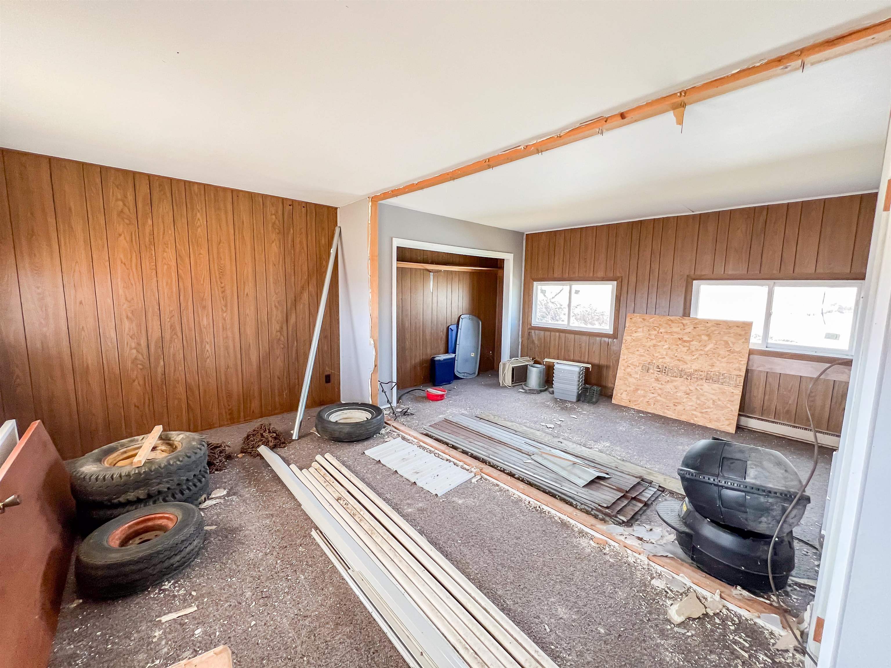 3114 South Rush Creek Road Stockton, IL 61085 - Photo 41 of 76 a bedroom with a bed and a mirror