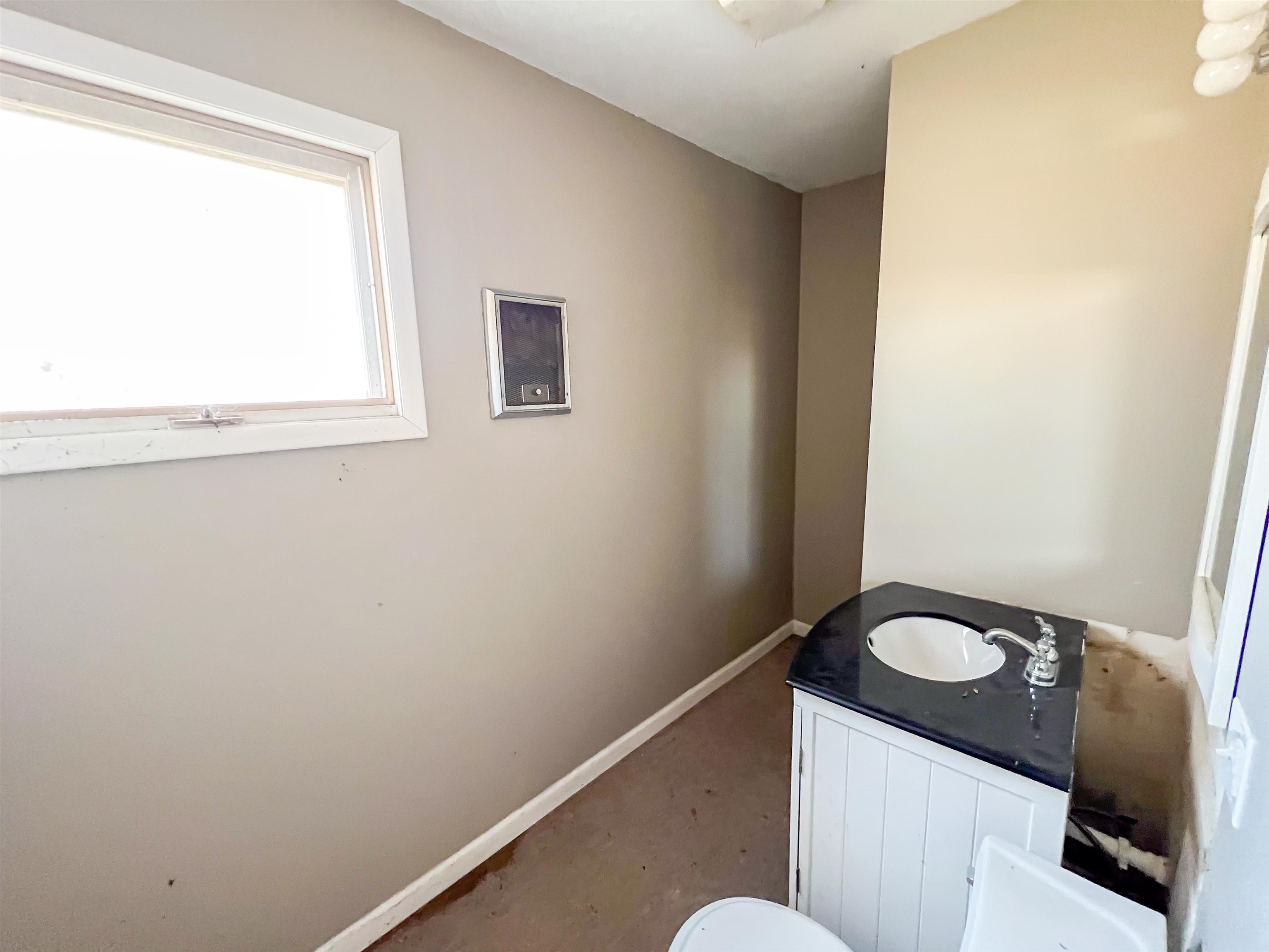 3114 South Rush Creek Road Stockton, IL 61085 - Photo 50 of 76 a bathroom with a granite countertop sink and a mirror