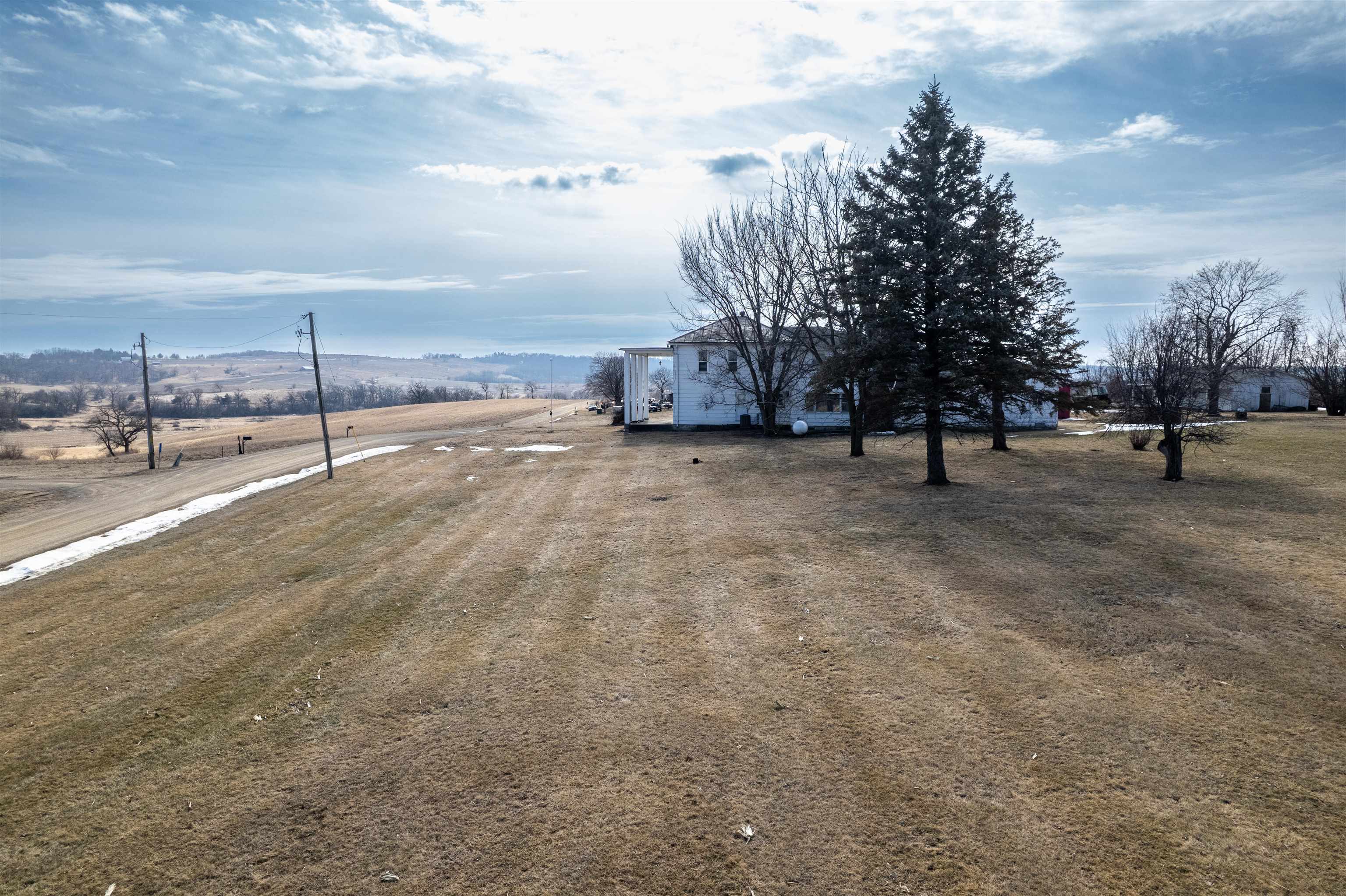 3114 South Rush Creek Road Stockton, IL 61085 - Photo 67 of 76 a view of a parking space with lots of trees