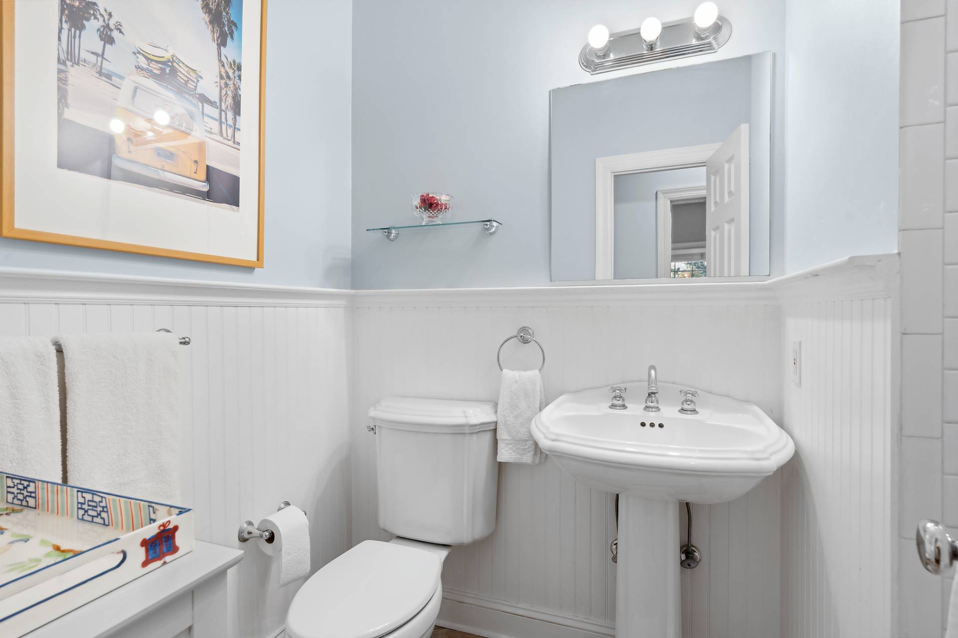 63 Whooping Hollow Road East Hampton, NY 11937 - Photo 13 of 25 a bathroom with a sink mirror and toilet