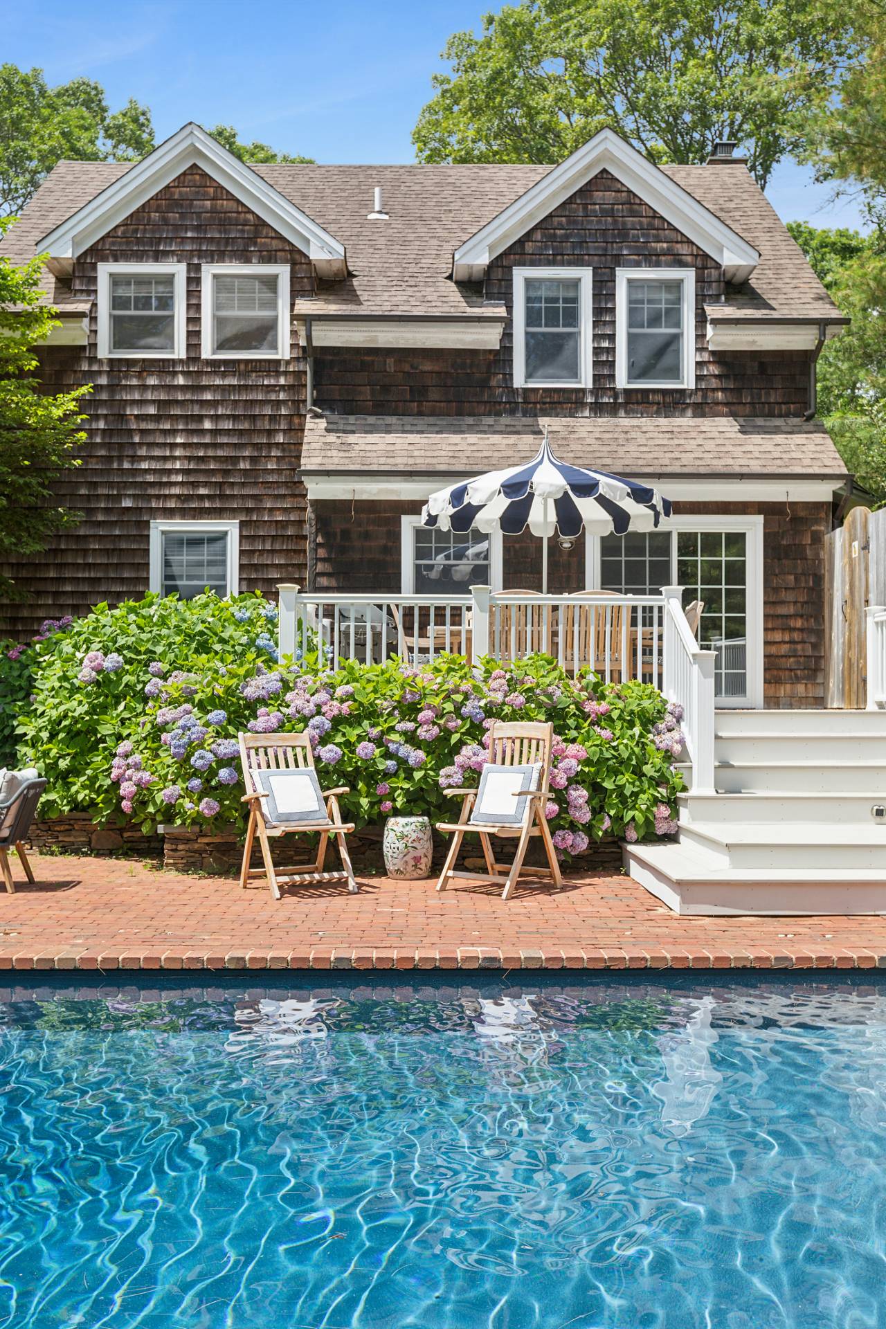 63 Whooping Hollow Road East Hampton, NY 11937 - Photo 18 of 25 a view of a house with yard and sitting area