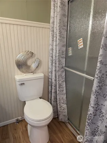 a room with a workspace and a window