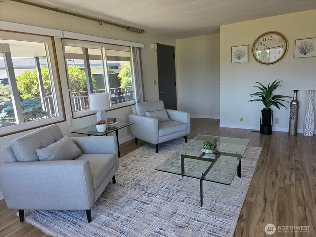 a view of a dining room with furniture window and outside view