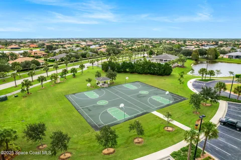 a view of an outdoor space and tennis court