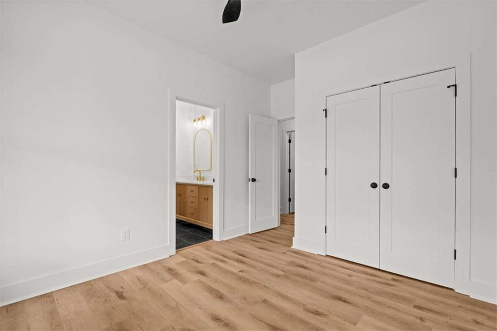 409 Lively Road Waco, GA 30182 - Photo 26 of 50 a view of an empty room with wooden floor