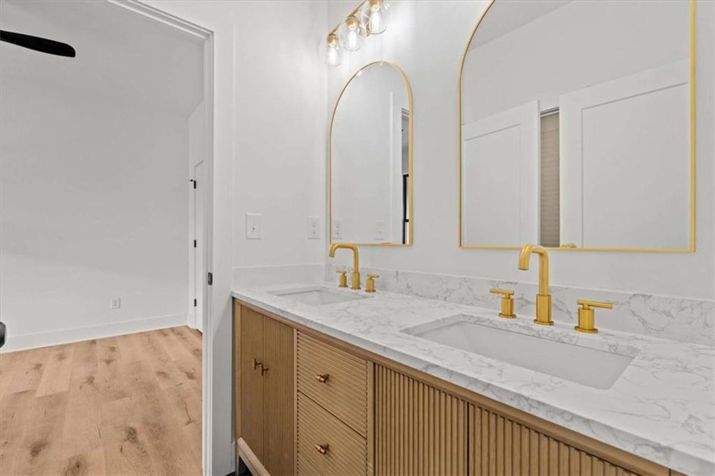 409 Lively Road Waco, GA 30182 - Photo 27 of 50 a bathroom with a sink and a mirror