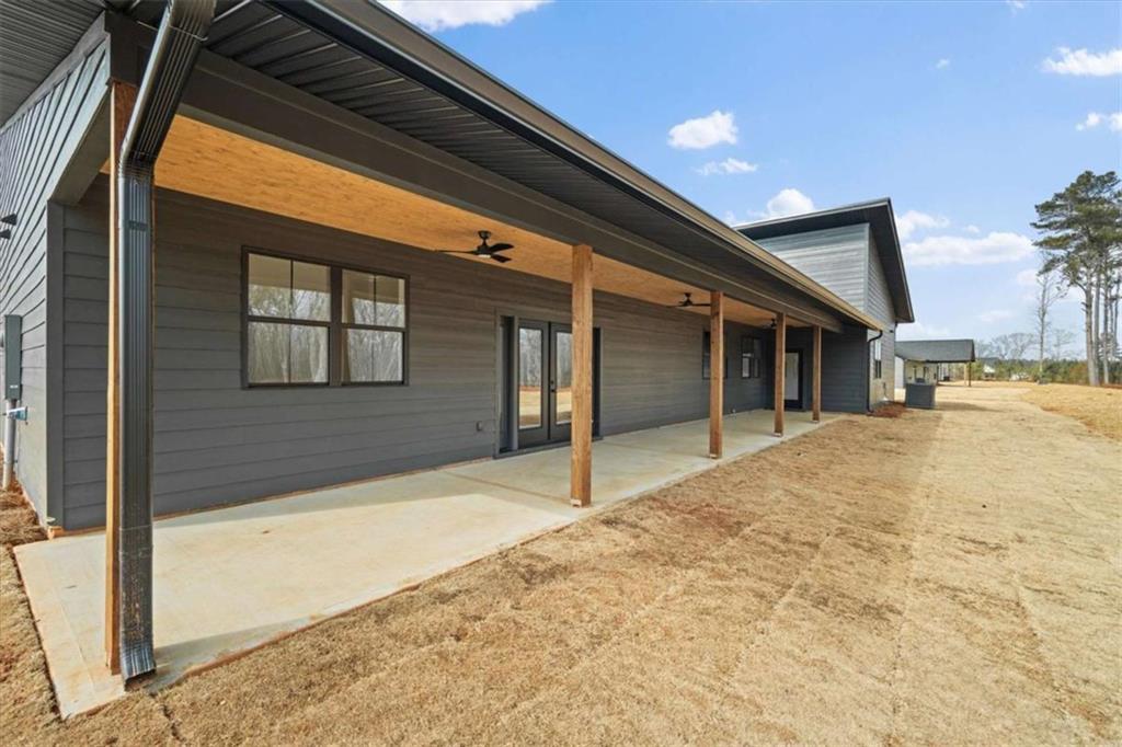 409 Lively Road Waco, GA 30182 - Photo 38 of 50 a view of house with large windows