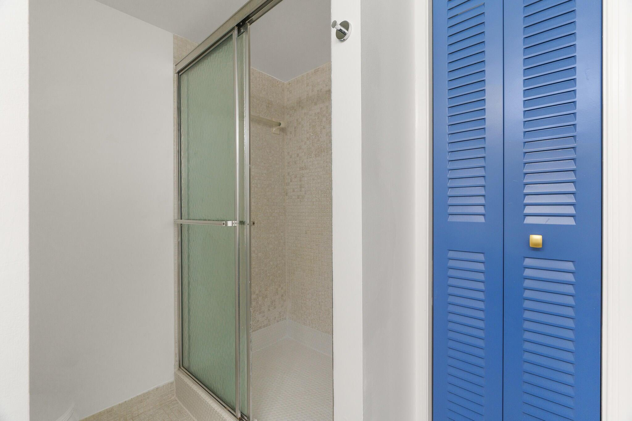 950 Ponce De Leon Road, Unit 208 Boca Raton, FL 33432 - Photo 19 of 43 a bathroom with a shower