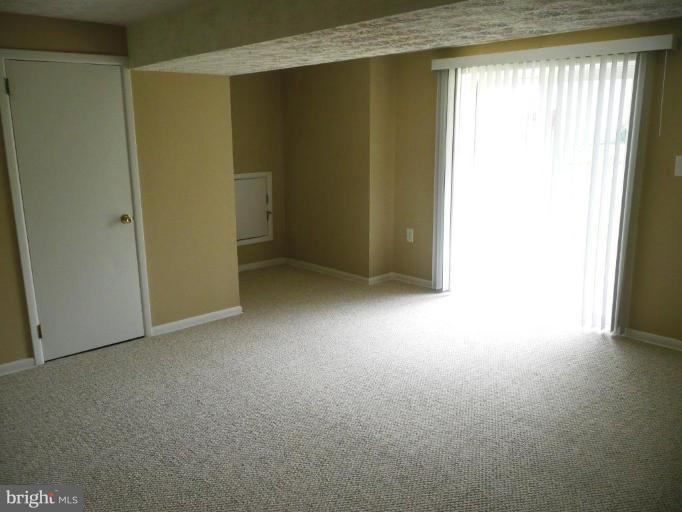 4713 East Joppa Road Nottingham, MD 21236 - Photo 11 of 24 a view of empty room with window