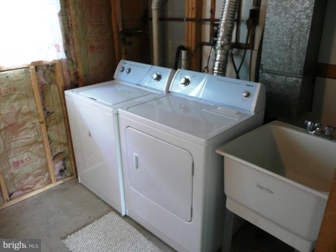 4713 East Joppa Road Nottingham, MD 21236 - Photo 16 of 24 a utility room with dryer and washer