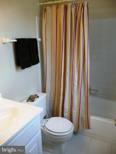 4713 East Joppa Road Nottingham, MD 21236 - Photo 20 of 24 a bathroom with a toilet and a sink