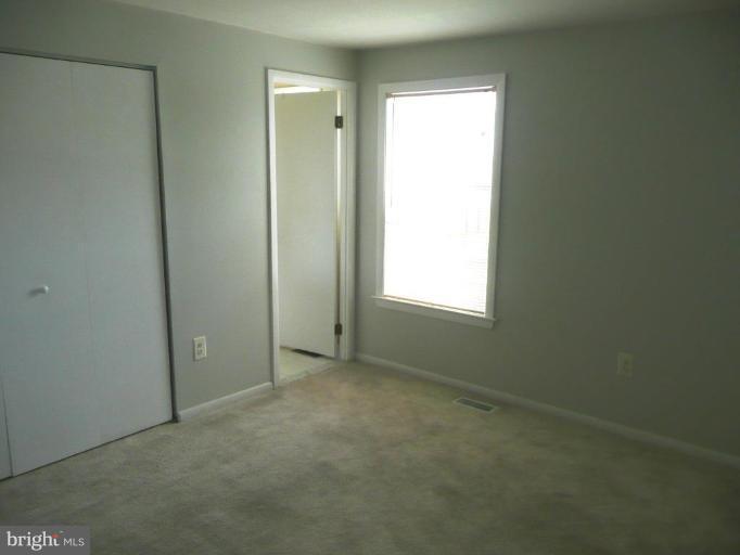 4713 East Joppa Road Nottingham, MD 21236 - Photo 22 of 24 a view of an empty room with a window