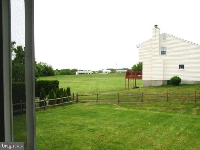 4713 East Joppa Road Nottingham, MD 21236 - Photo 4 of 24 a view of a garden with lawn chairs