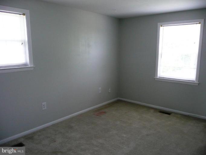 4713 East Joppa Road Nottingham, MD 21236 - Photo 6 of 24 an empty room with a window