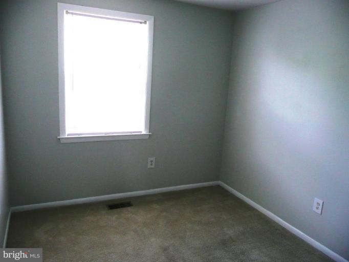 4713 East Joppa Road Nottingham, MD 21236 - Photo 7 of 24 an empty room with a window