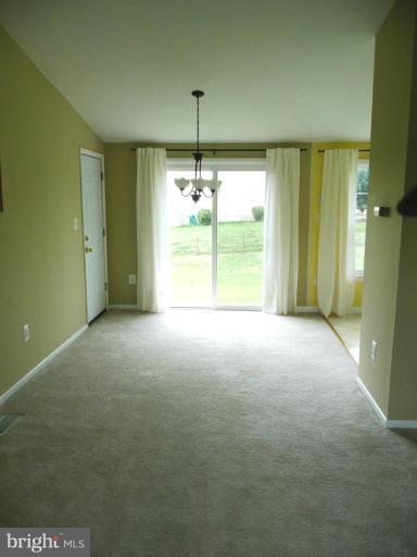 4713 East Joppa Road Nottingham, MD 21236 - Photo 8 of 24 a view of an empty room with a window