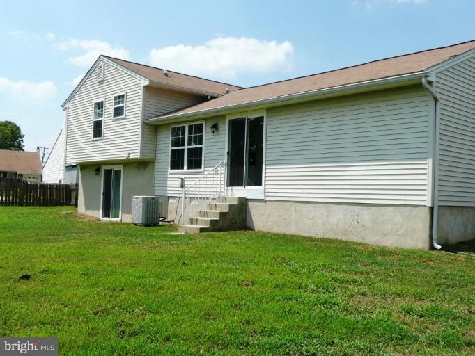 4713 East Joppa Road Nottingham, MD 21236 - Photo 10 of 24 a view of a house with a backyard