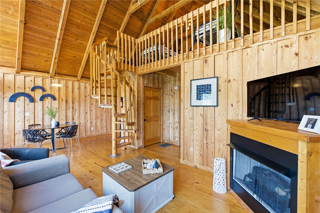 1 Kitty Hawk Lane Six Mile, SC 29682 - Photo 12 of 46 This inviting interior features a warm wooden aesthetic with an open-concept design.