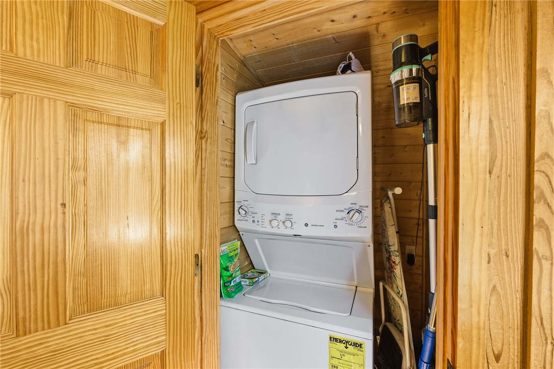 1 Kitty Hawk Lane Six Mile, SC 29682 - Photo 18 of 46 This dedicated laundry space offers convenience and efficiency within a cozy setting.