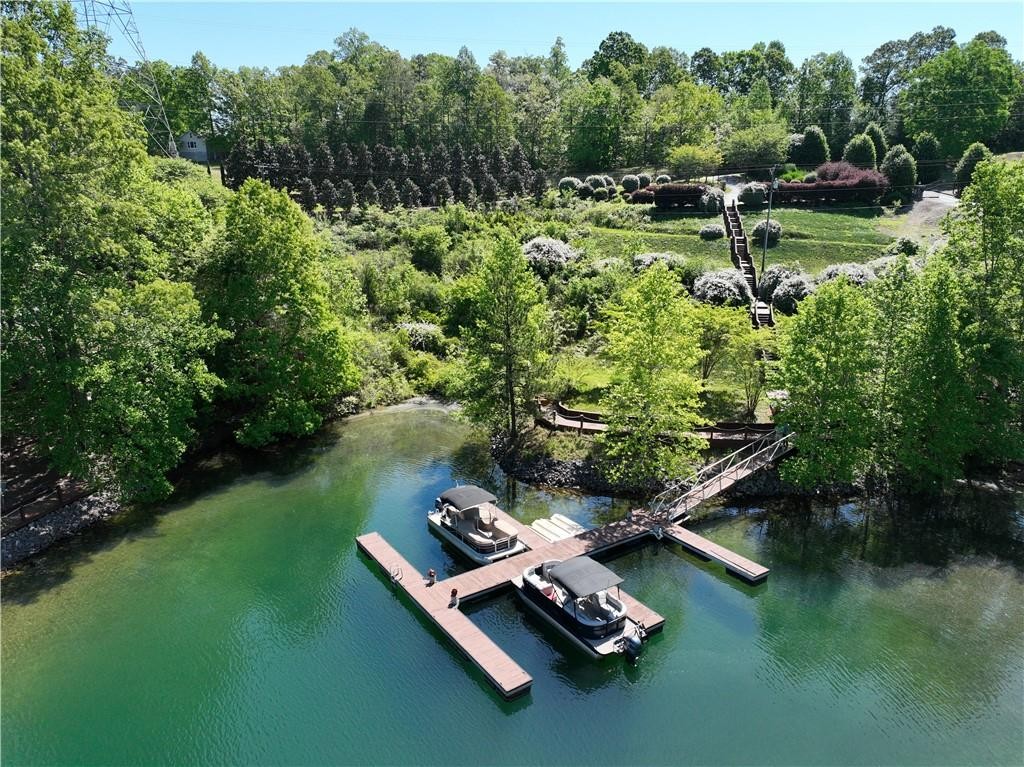 1 Kitty Hawk Lane Six Mile, SC 29682 - Photo 2 of 46 This serene waterfront property offers direct lake access and a private dock.