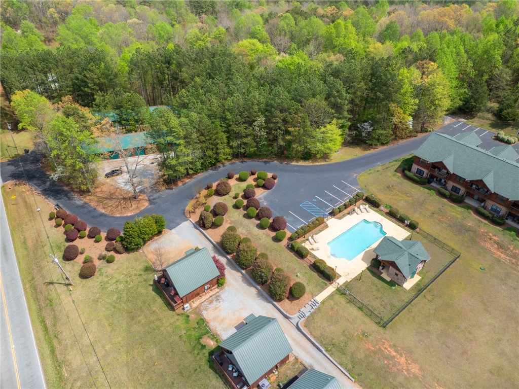 1 Kitty Hawk Lane Six Mile, SC 29682 - Photo 30 of 46 An aerial view showcases a vibrant community with recreational amenities amidst lush greenery.
