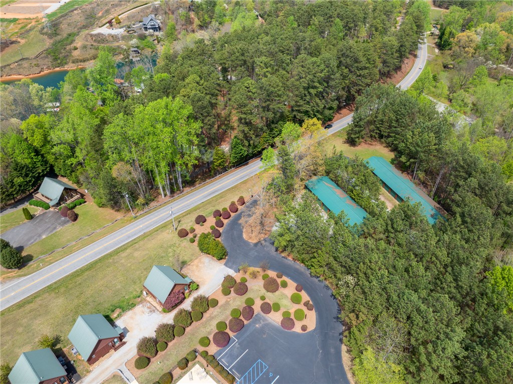 1 Kitty Hawk Lane Six Mile, SC 29682 - Photo 33 of 46 This elevated view captures charming homes nestled among lush trees, offering a serene, private setting.