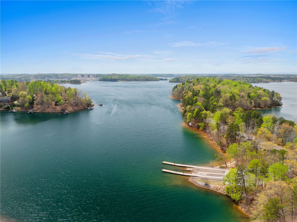 1 Kitty Hawk Lane Six Mile, SC 29682 - Photo 37 of 46 This tranquil waterfront property offers picturesque lake views and private boat docks.