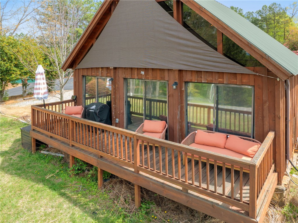 1 Kitty Hawk Lane Six Mile, SC 29682 - Photo 5 of 46 This charming home offers an inviting deck, perfect for outdoor living and entertaining.