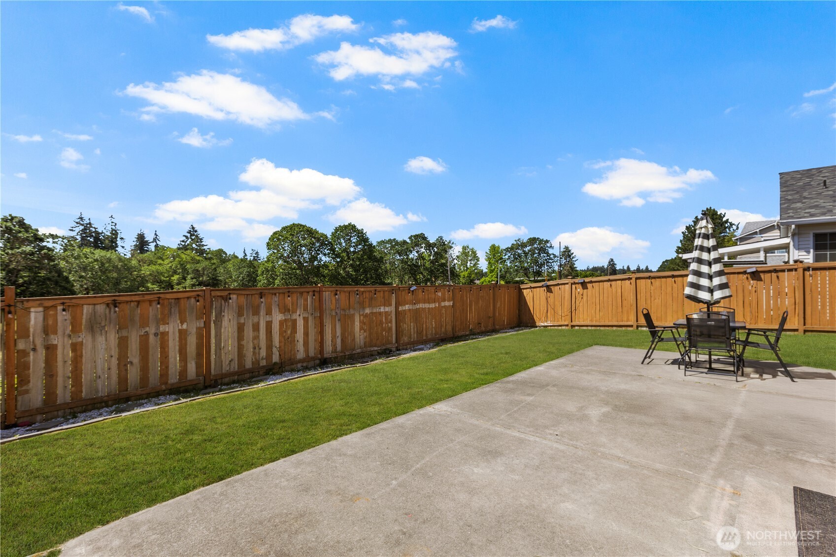 8305 Sweetbrier Loop Southeast Olympia, WA 98513 - Photo 36 of 40 a view of a yard with a trampoline