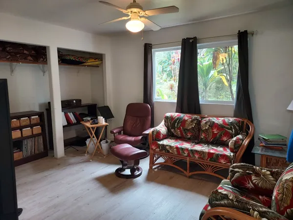 a living room with furniture and a window
