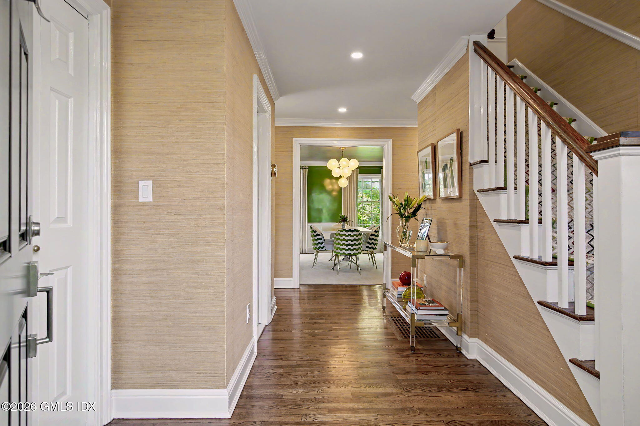 10 Newton Street Riverside, CT 06878 - Photo 5 of 28 a view of a hallway with wooden floor and staircase
