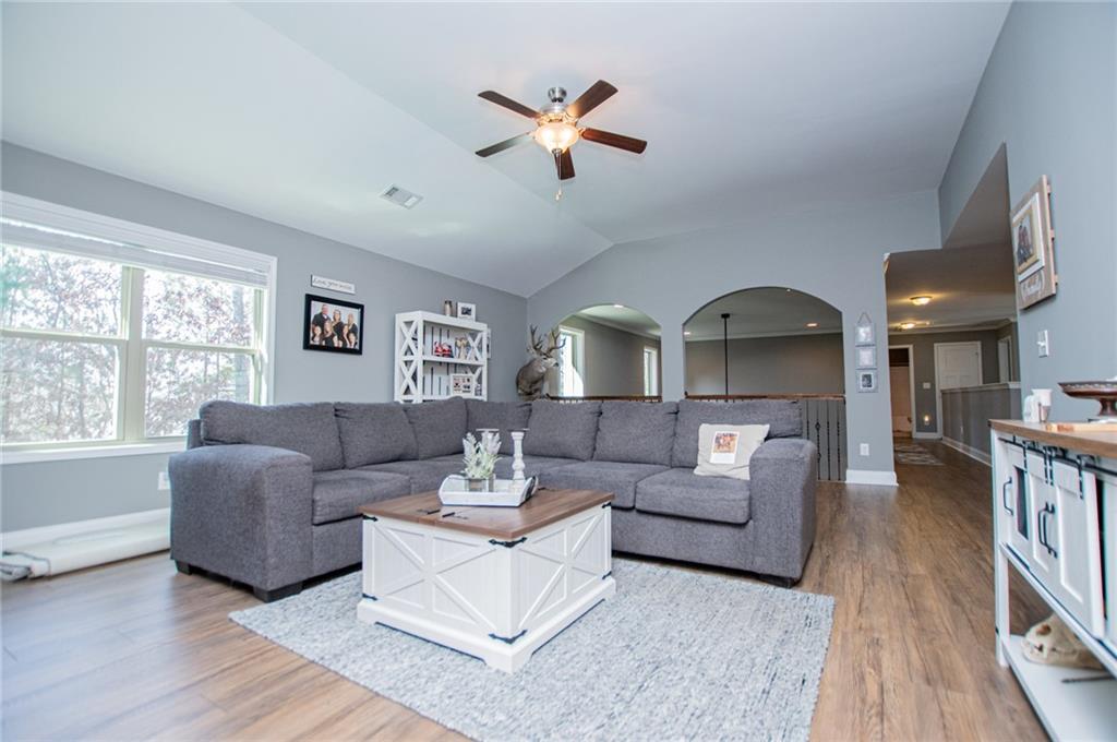 201 Overton Point Carrollton, GA 30116 - Photo 20 of 43 a living room with furniture and a large window