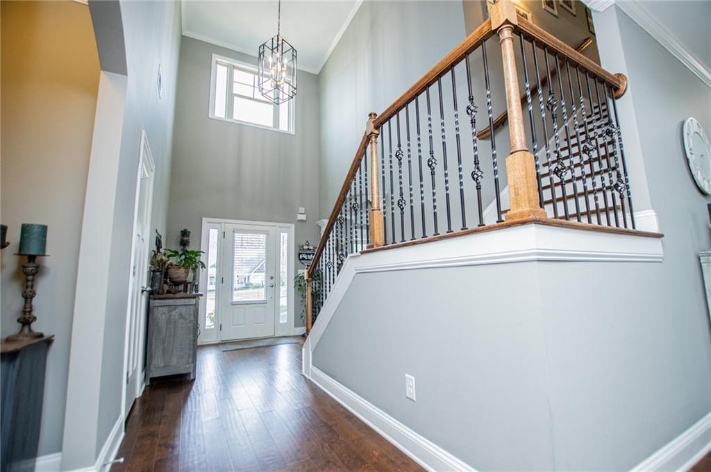 201 Overton Point Carrollton, GA 30116 - Photo 2 of 43 a view of entryway and hall with wooden floor