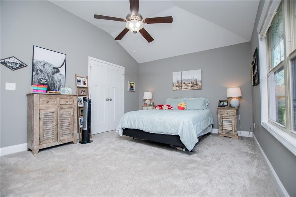 201 Overton Point Carrollton, GA 30116 - Photo 21 of 43 a bedroom with a bed dresser and a window