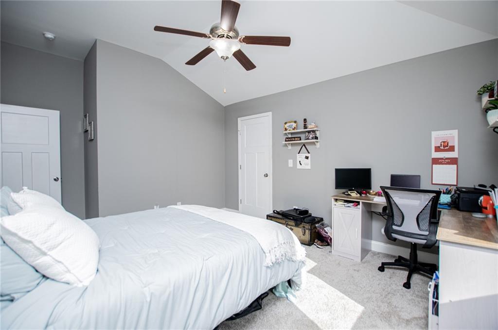 201 Overton Point Carrollton, GA 30116 - Photo 22 of 43 a bedroom with a workspace