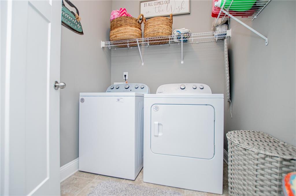 201 Overton Point Carrollton, GA 30116 - Photo 27 of 43 a utility room with dryer and washer