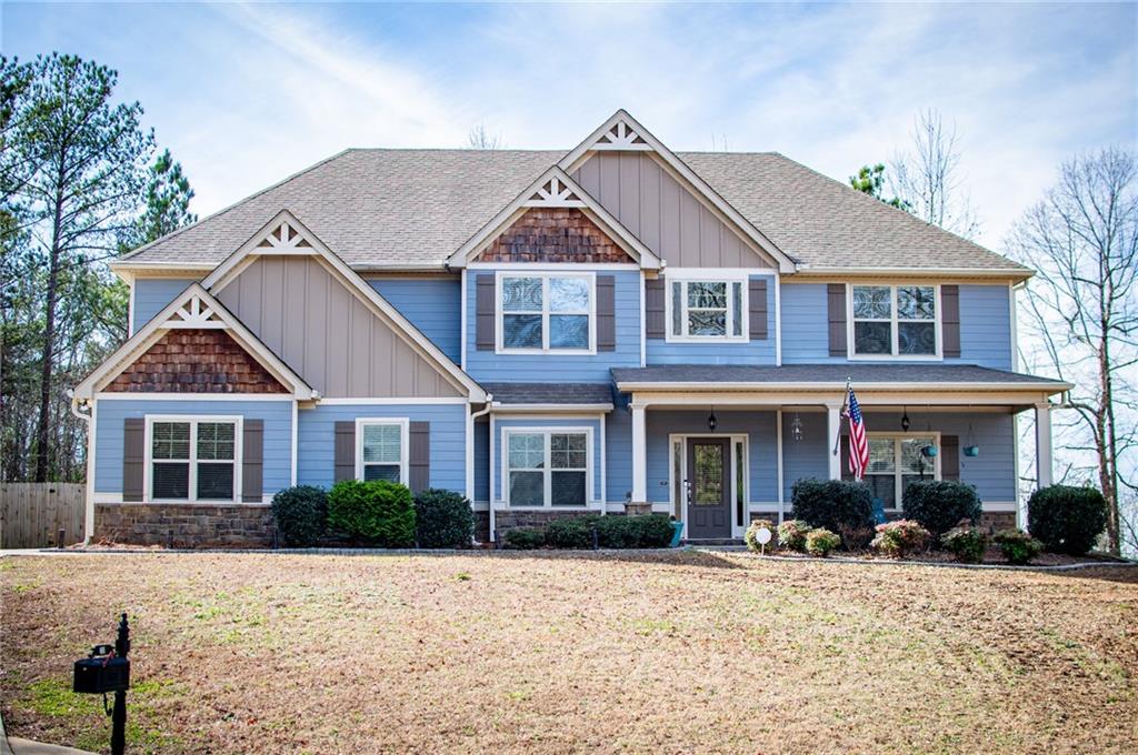 201 Overton Point Carrollton, GA 30116 - Photo 31 of 43 a front view of a house with yard and trees