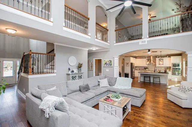 a view of a dinning table and chairs in patio of the house